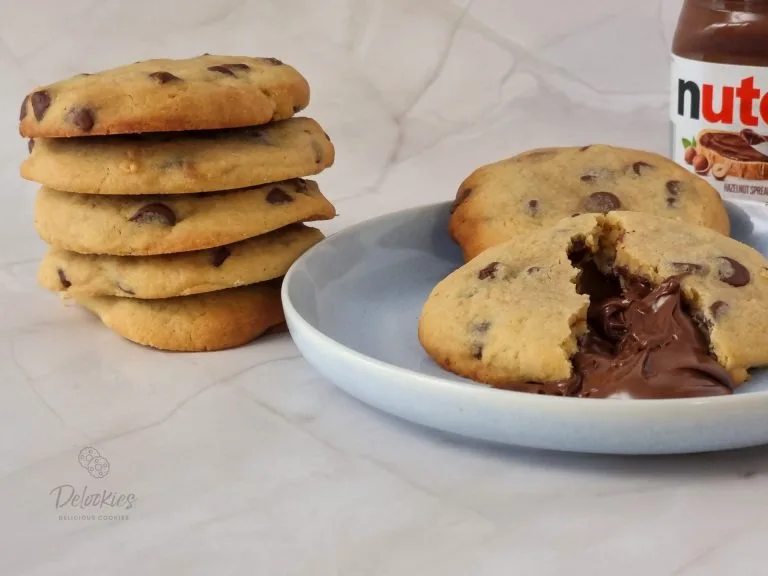 Delookies Nutella Stuffed Cookies — soft, chocolate chip-packed treats with a gooey Nutella centre