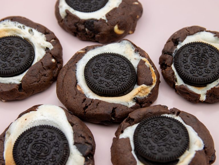 Oreo and Marshmallow Cookies featuring marshmallow-filled chocolate cookies with Oreo centre standing vertically.
