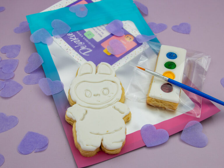 Paint your own Labubu cookie favour with edible paint palette and brush styled for kids party activity