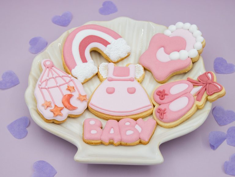 baby shower cookie set with pastel props