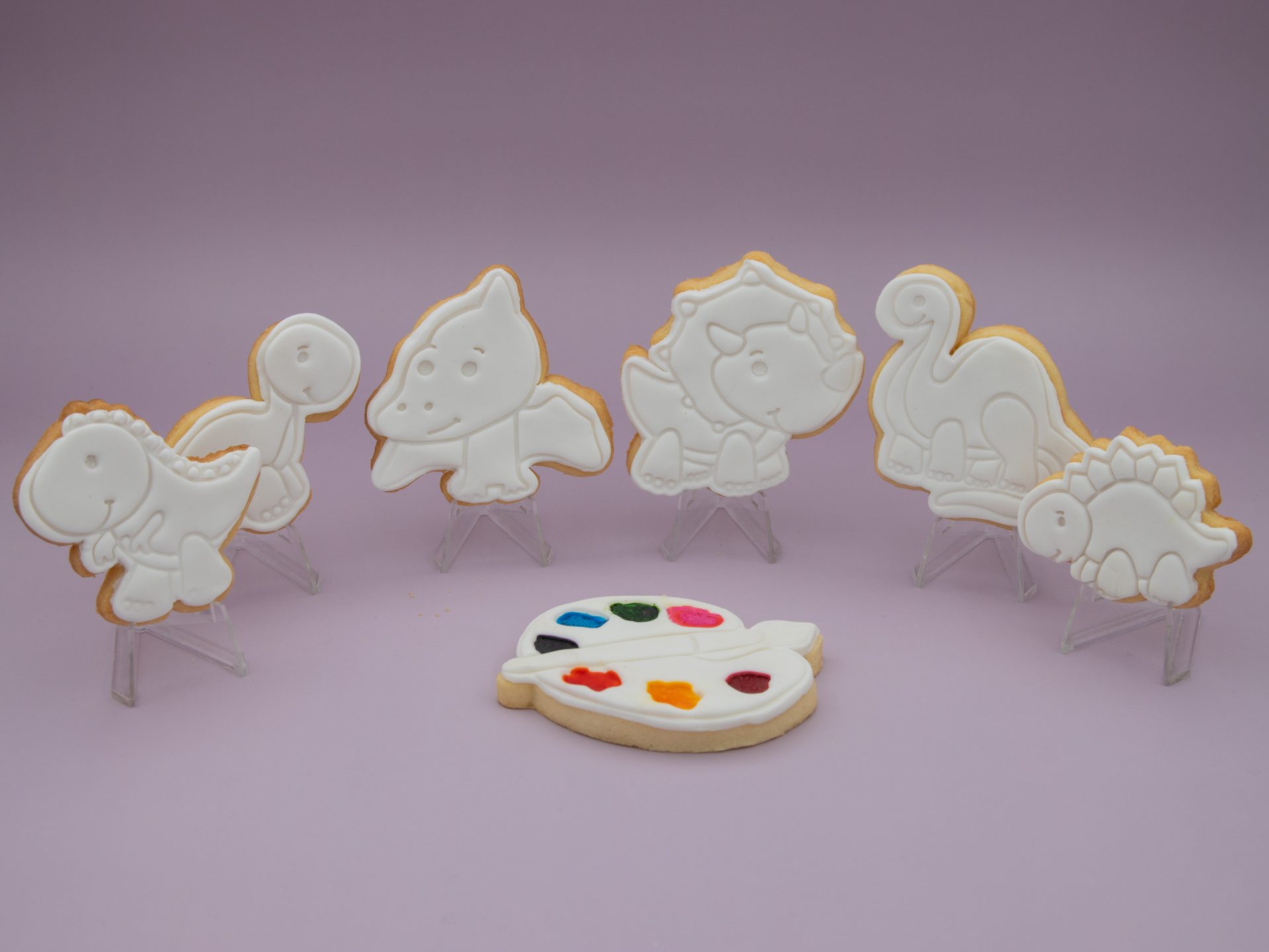 dinosaur PYO cookies standing upright in a row