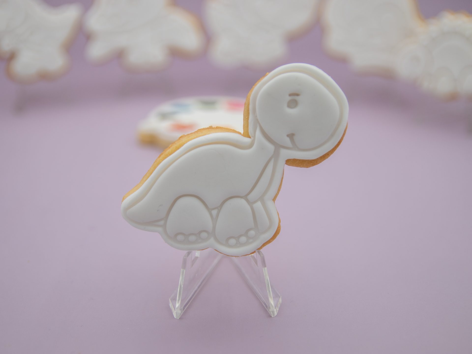 baby dinosaur cookie with fondant for edible painting