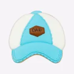 Father’s Day cookie shaped like a blue cap with “Dad” badge