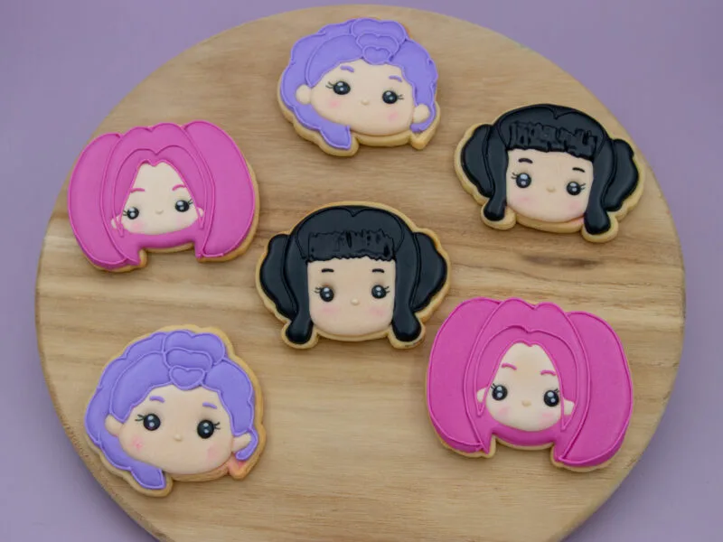 Kpop Huntrix decorated cookies styled for fan party setup