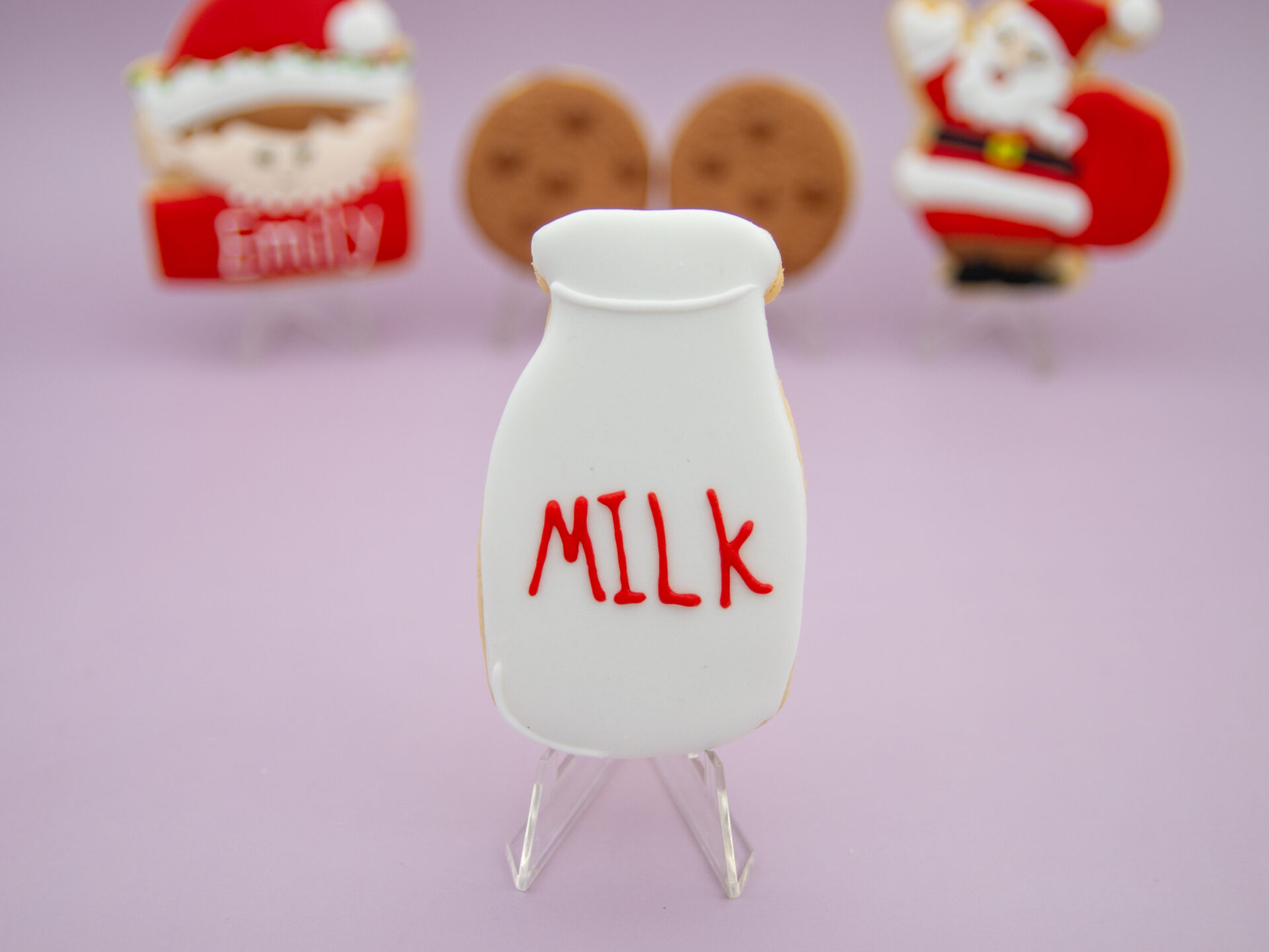 Milk bottle royal icing cookie with red MILK lettering