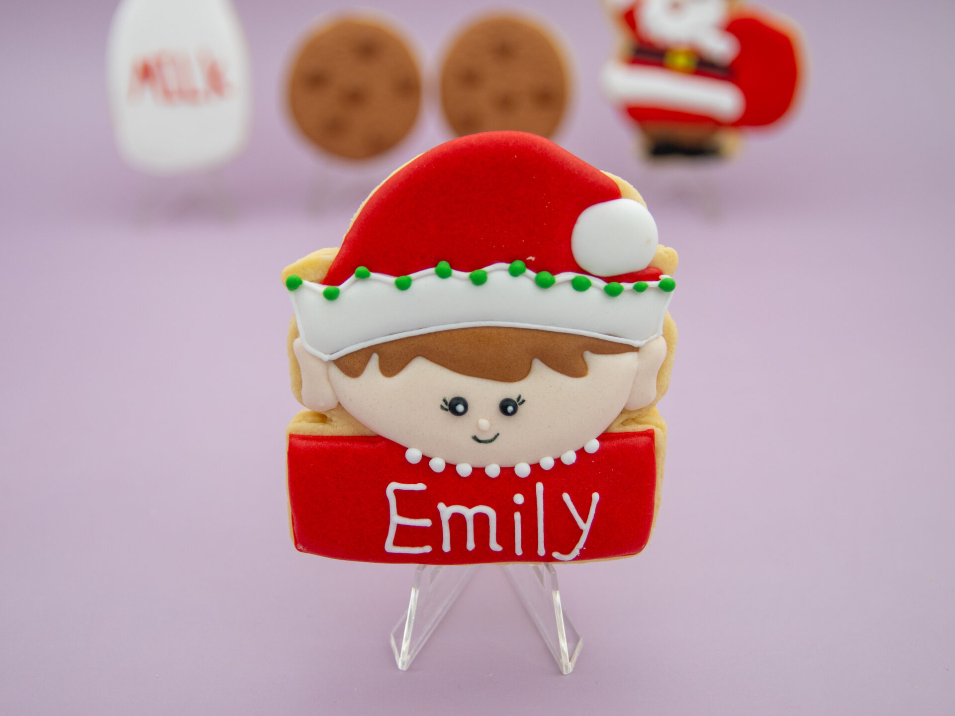 Personalised elf royal icing cookie with festive colours