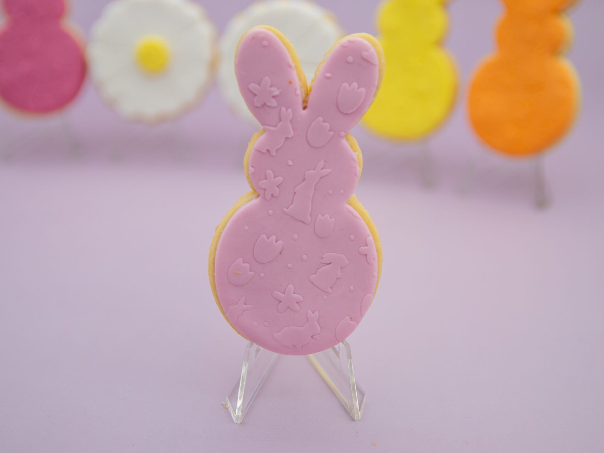 Light pink bunny fondant Easter cookie with embossed pattern details