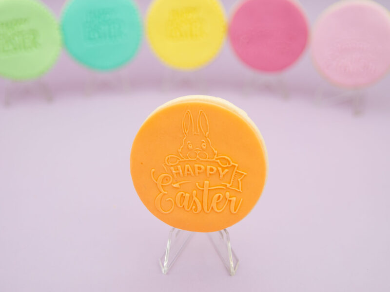 Peach Happy Easter fondant cookie with embossed Easter message and bunny detail