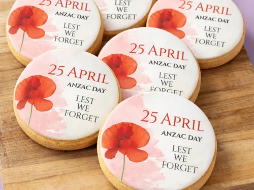 ANZAC Day Tribute Cookies styled with poppy printed fondant design and commemorative details