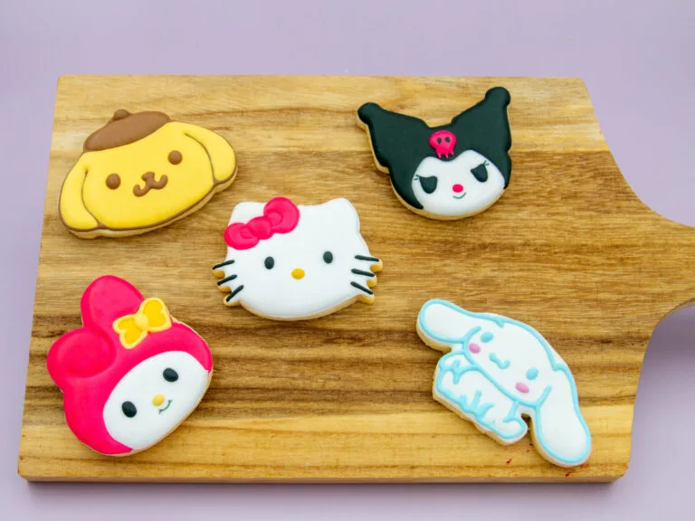 Hello Kitty & Friends character cookies styled for a birthday party with playful props