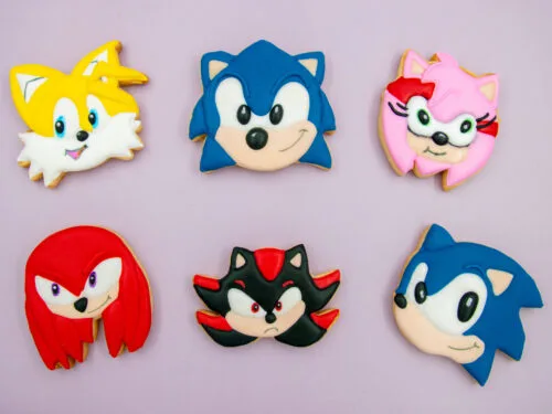 Sonic Birthday Character Cookies flat lay with colourful royal icing details on a pastel background