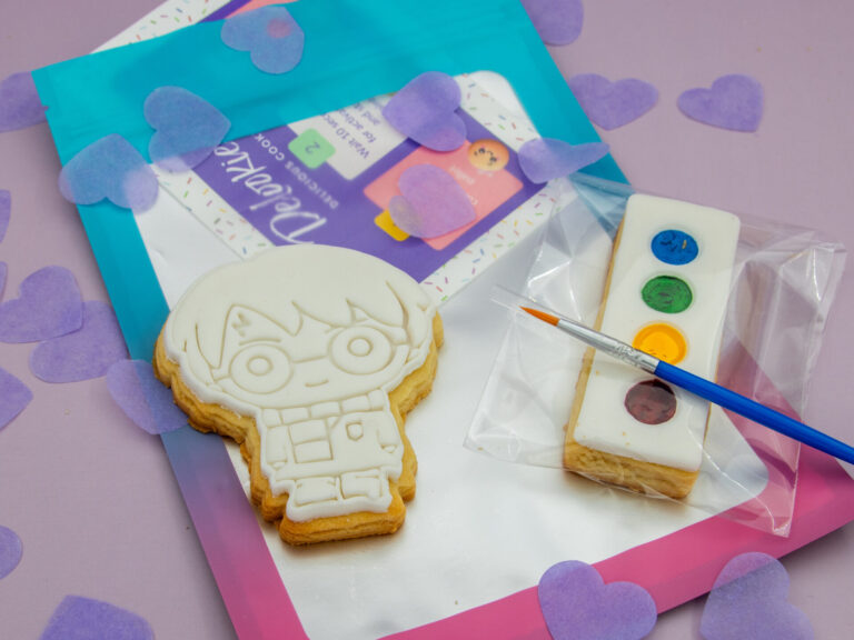 Paint your own Harry Potter cookie favour with edible palette and brush for kids party activity
