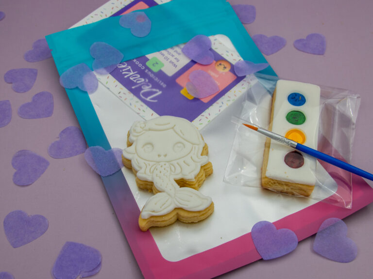 Paint your own mermaid cookie favour with edible paint palette and brush for kids party activity