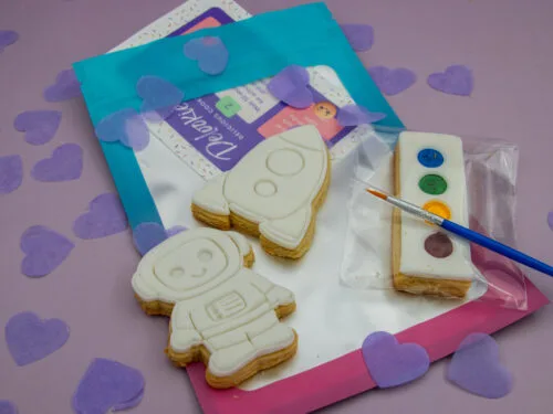 Astronaut and rocket DIY cookie favour with edible paint palette and brush for space themed party bags