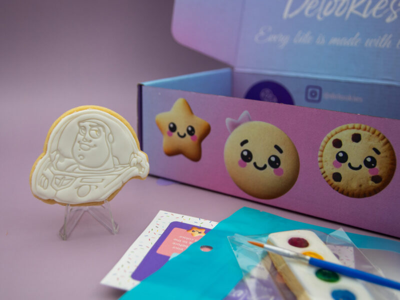 Buzz Lightyear DIY cookie favour standing upright with edible painting kit for birthday party bags