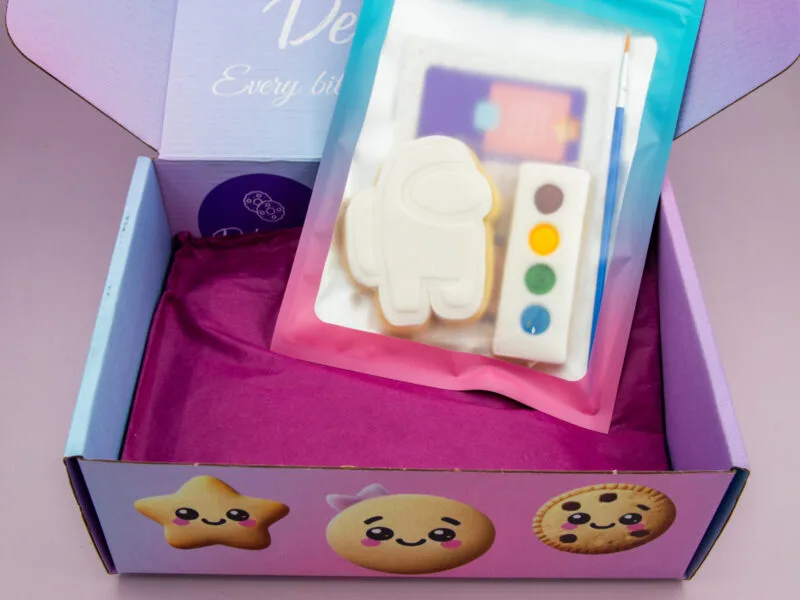Among Us PYO cookie favour packed with palette, brush and guide card in heat sealed wrapper