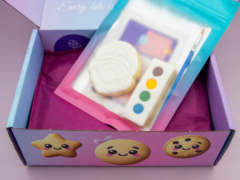 Paint your own Mario cookie favour packed with palette, brush and guide card in heat sealed wrapper