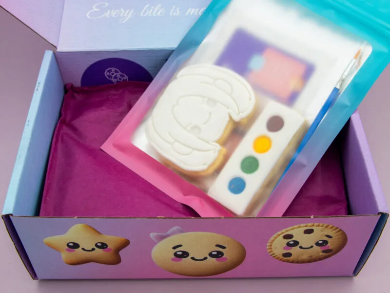 Mira Kpop Huntrix DIY cookie favour packed with palette, brush and guide card in heat sealed wrapper