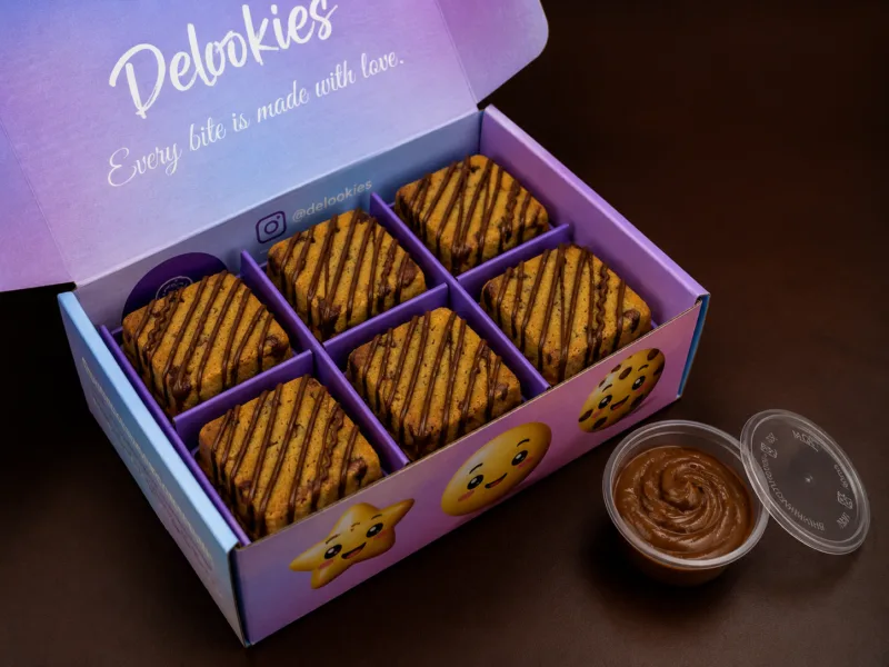 Choc Hazelnut Cookie Cubes with chocolate drizzle in Delookies box