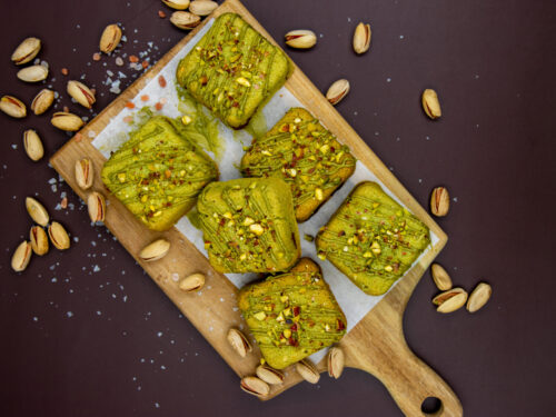 Top view of Pistachio Cream Cookie Cubes topped with crushed pistachios