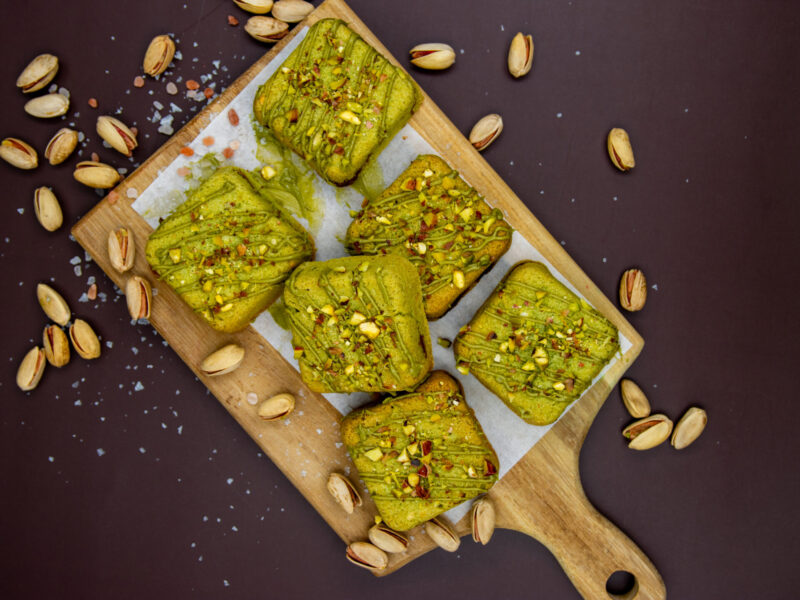 Top view of Pistachio Cream Cookie Cubes topped with crushed pistachios