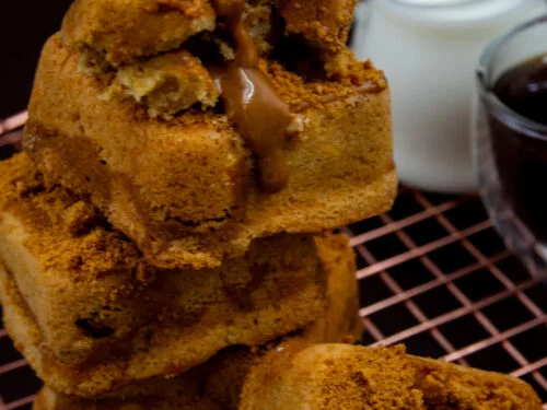 Stacked Biscoff Cream Cookie Cubes with melted Biscoff filling and biscuit crumb topping