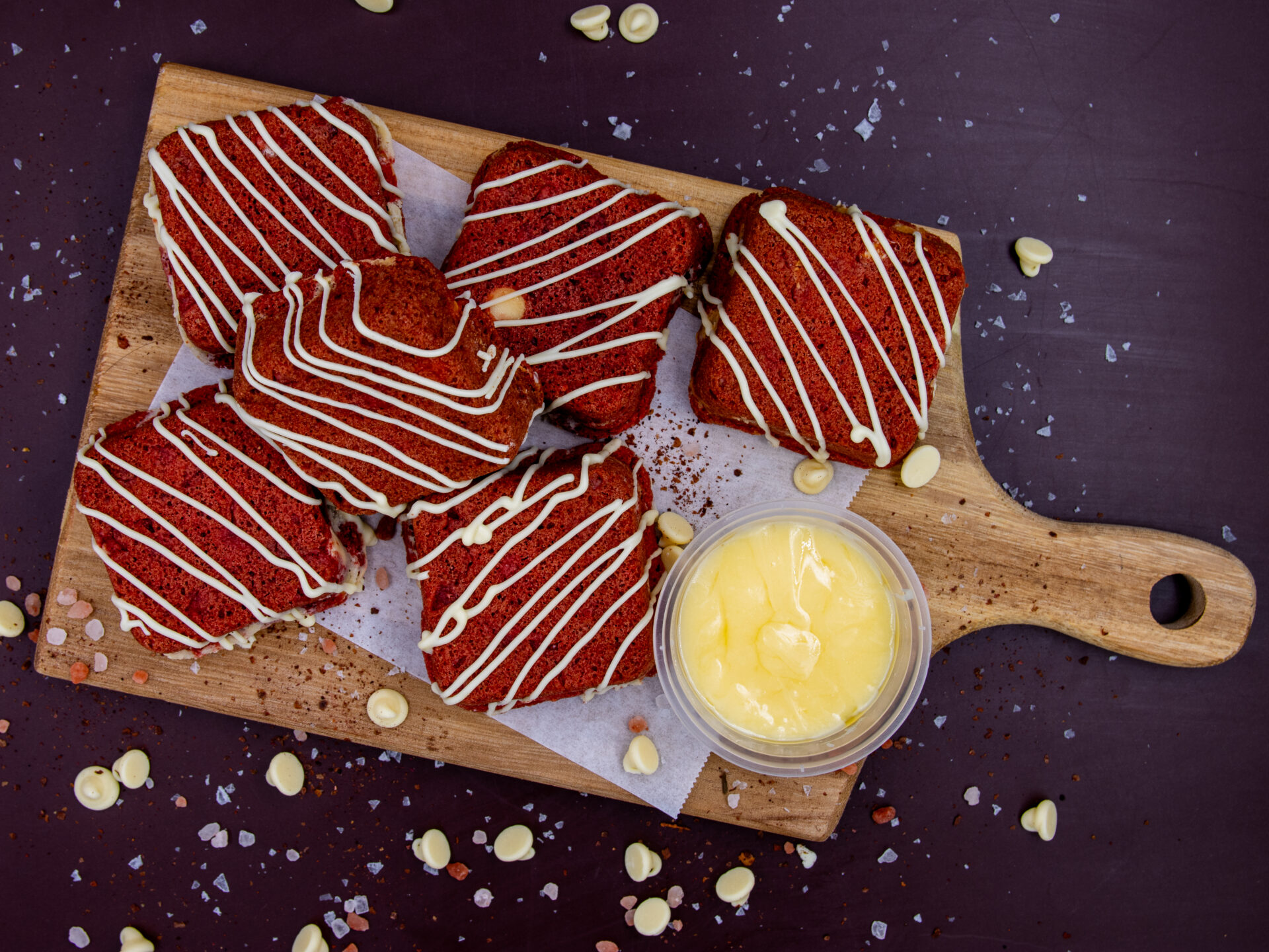 Soft-baked Red Velvet Cream Cookie Cubes on wooden serving board